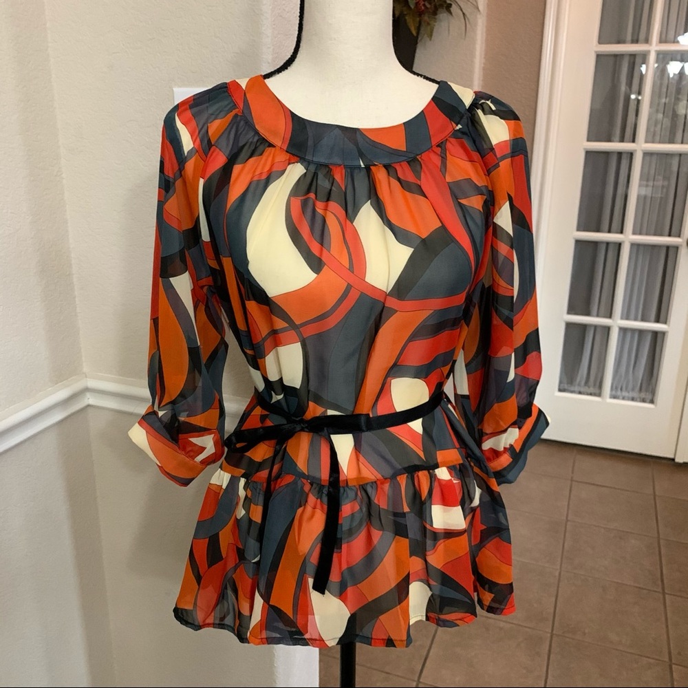 Capacity orange and black geometric print peplum top blouse  Size M
